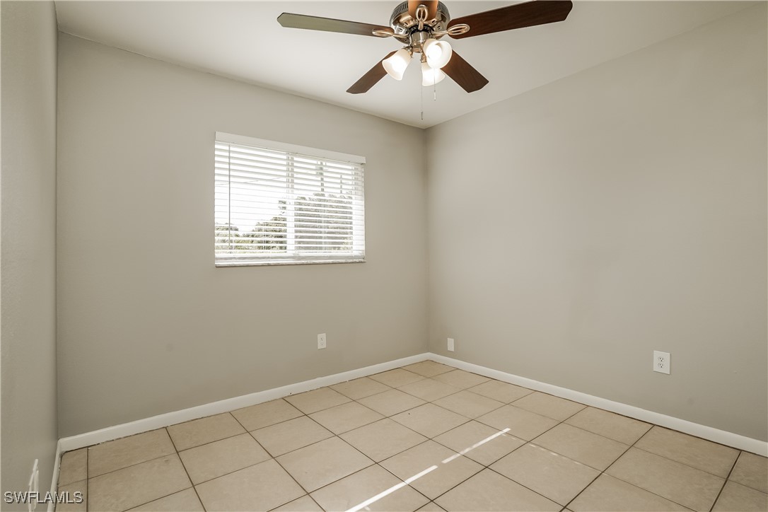 16981 First Street Alva, FL 33920 - Photo 13 of 16 a view of an empty room and window