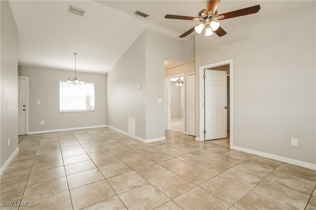 16981 First Street Alva, FL 33920 - Photo 3 of 16 a view of an empty room and window chandelier fan