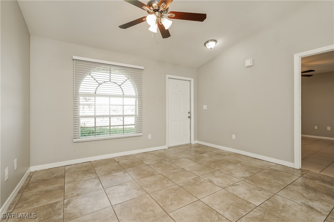 16981 First Street Alva, FL 33920 - Photo 4 of 16 a view of an empty room with a window