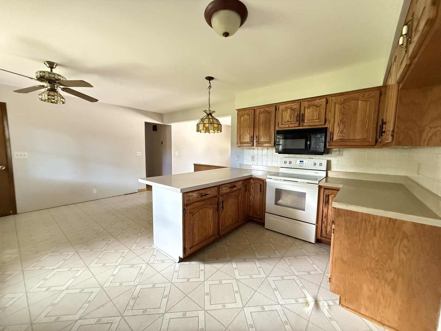 1029 West 4th Street Spring Valley, IL 61362 - Photo 11 of 27 a kitchen with a sink appliances and cabinets