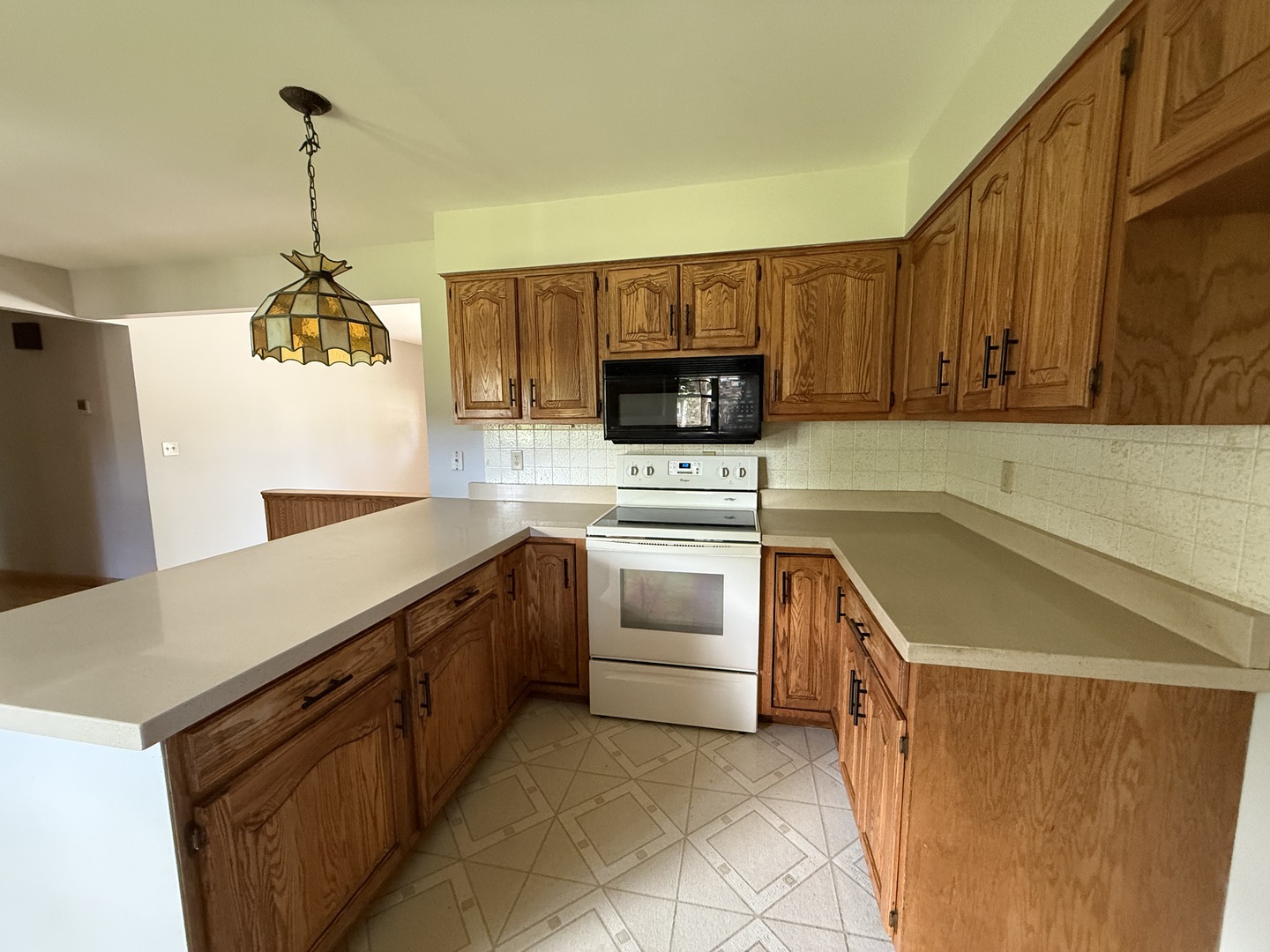 1029 West 4th Street Spring Valley, IL 61362 - Photo 12 of 27 a kitchen with a cabinets and appliances