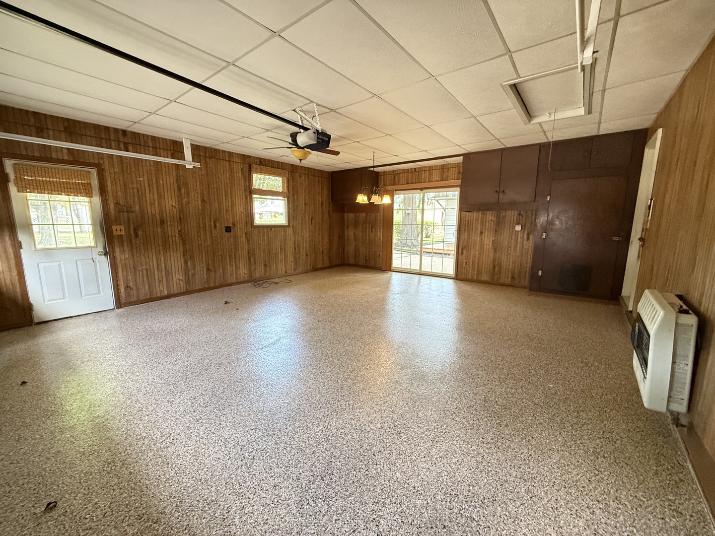 1029 West 4th Street Spring Valley, IL 61362 - Photo 19 of 27 a view of a livingroom with wooden floor and windows