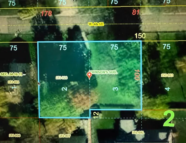 a view of a garden from a balcony