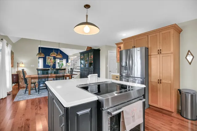 a kitchen with a sink and a window