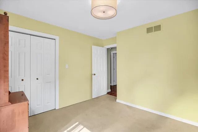 a view of a workspace with furniture