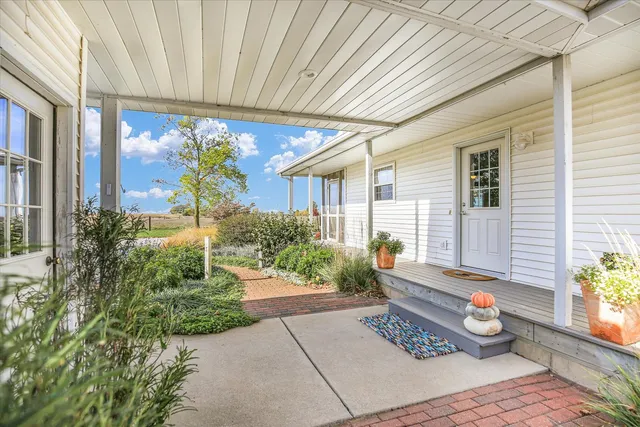 a view of a room with wooden walls