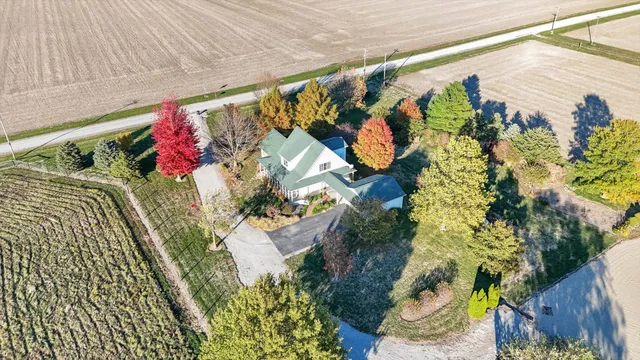 swimming pool view with a lake view