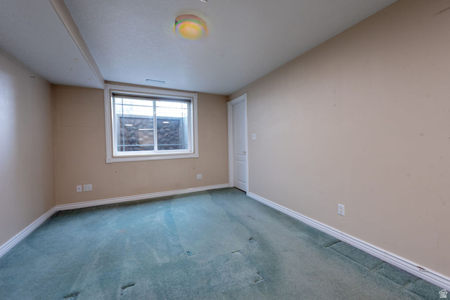 875 East 1300th Street North Mapleton, UT 84664 - Photo 48 of 65 Spare room with carpet and baseboards