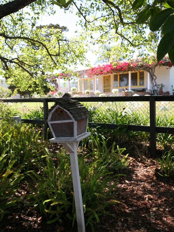 575 Refugio Road Goleta, CA 93117 - Photo 4 of 6 a view of a house with a tree in the background
