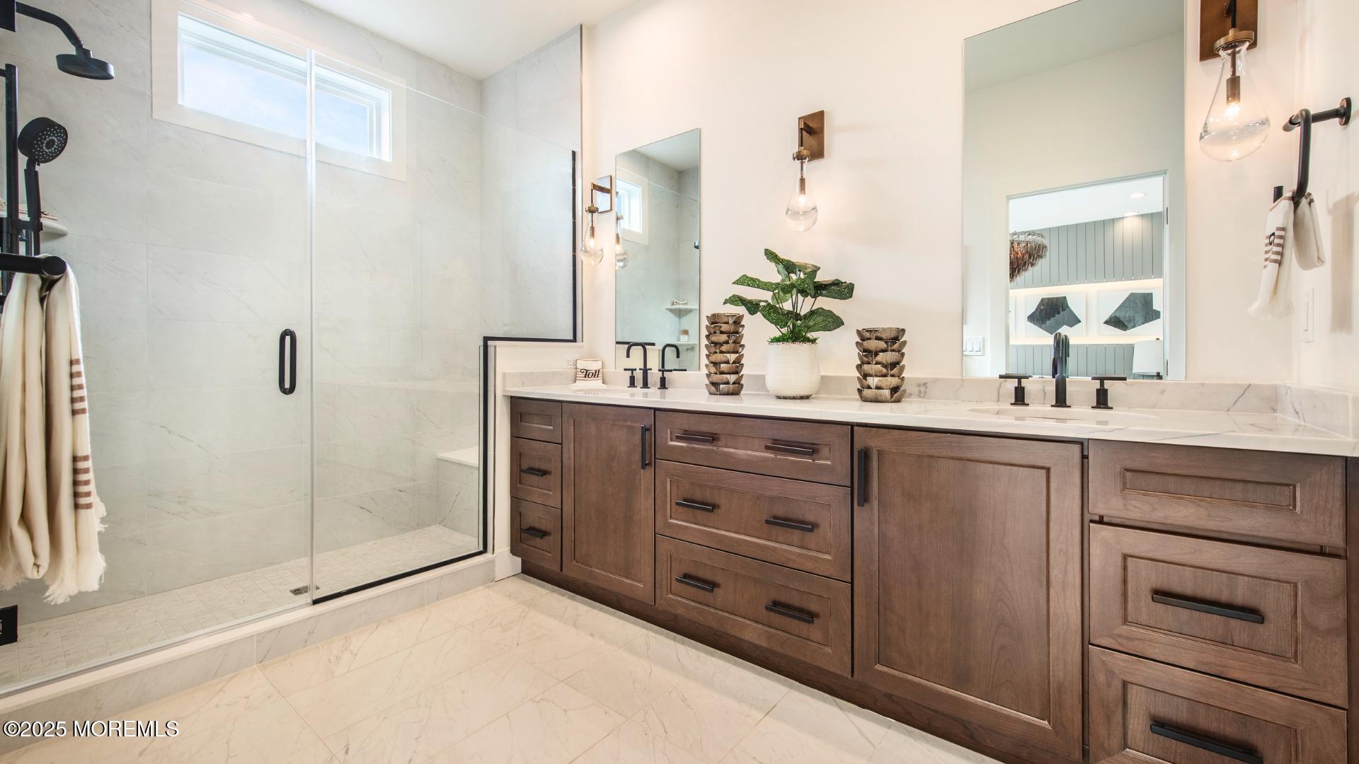 38 Waller Drive Middletown, NJ 07748 - Photo 4 of 19 a bathroom with a sink and a mirror