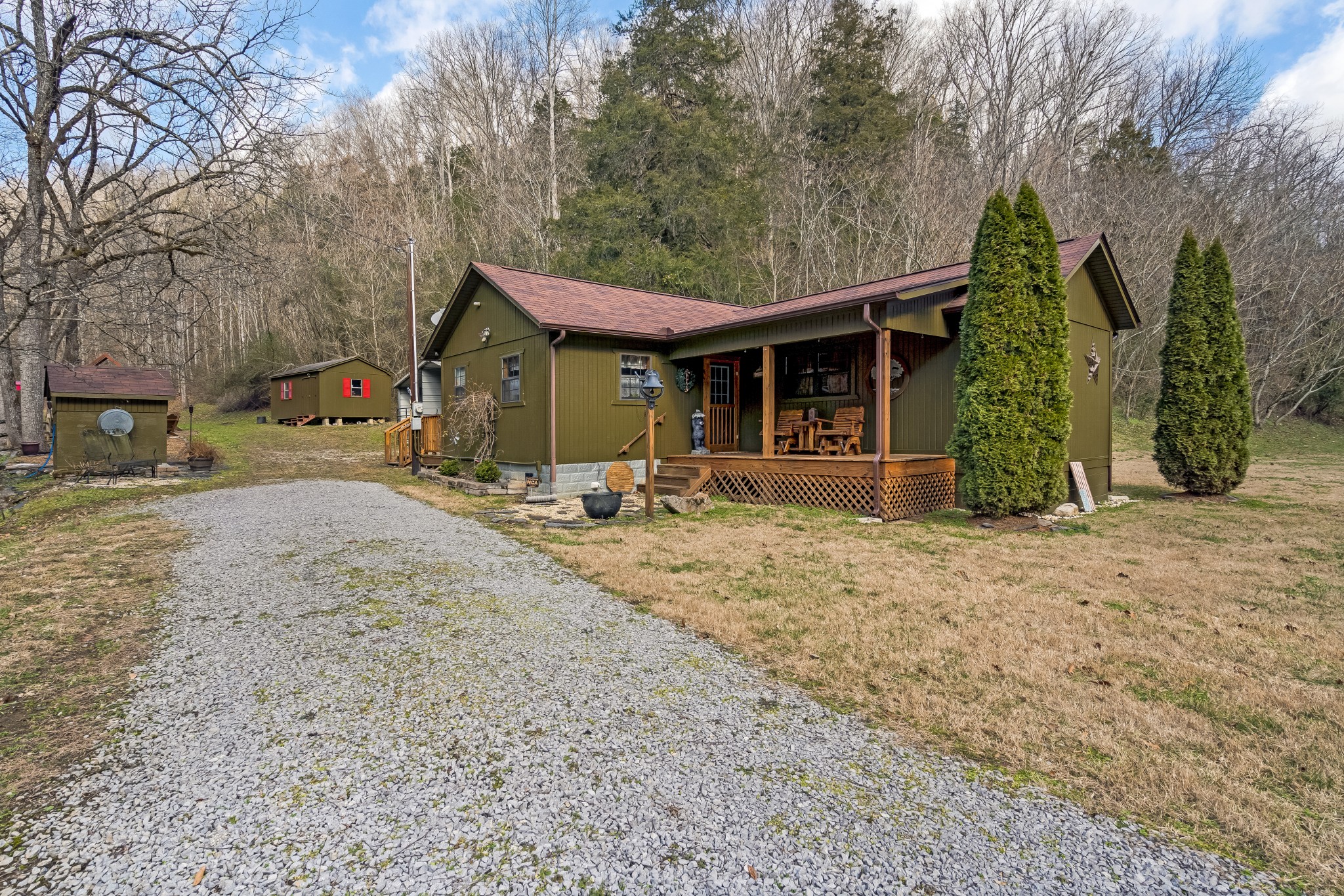 a front view of a house with garden
