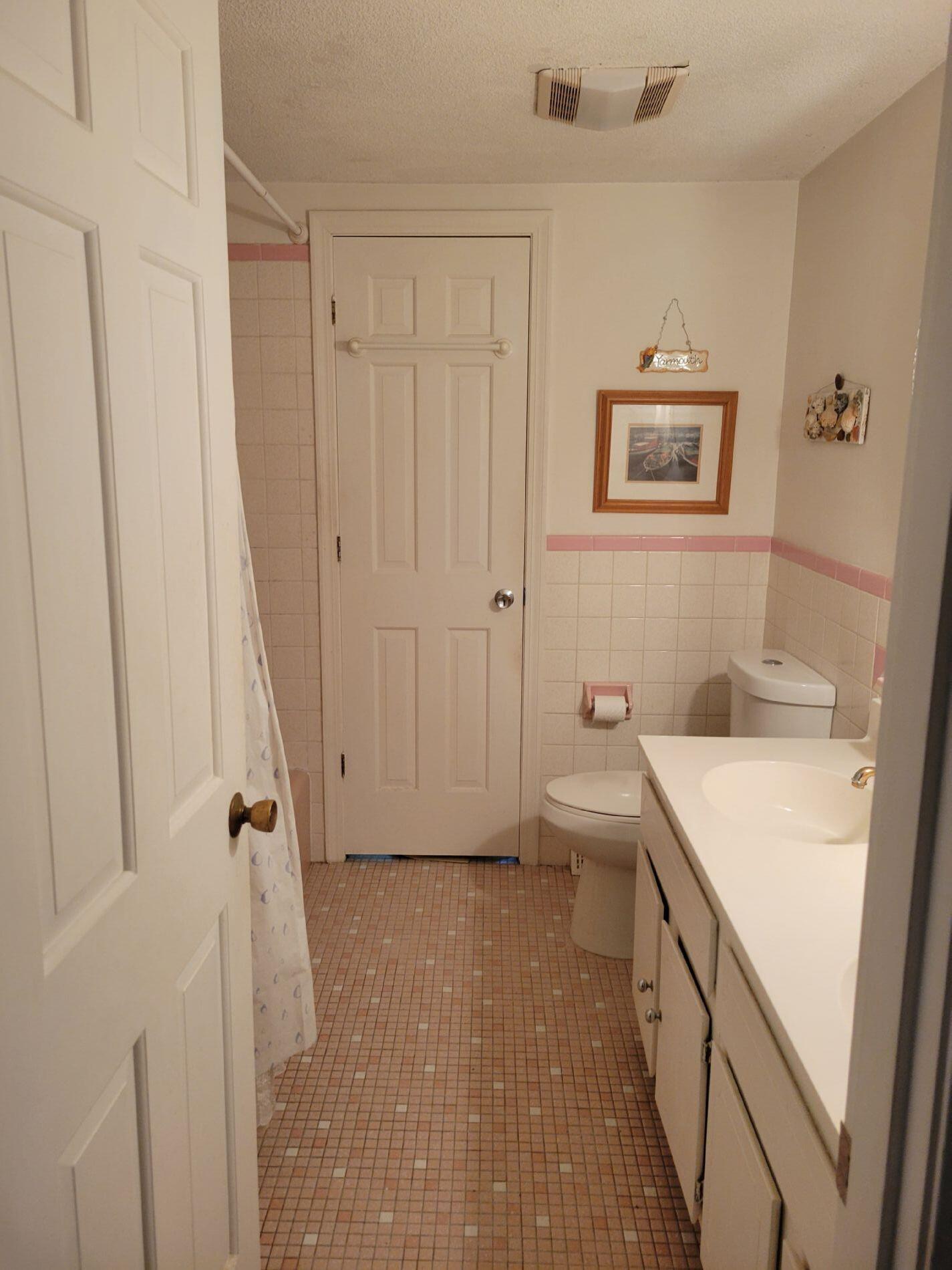 115 Captain Chase Road South Yarmouth, MA 02664 - Photo 15 of 36 a bathroom with a sink a toilet and a shower