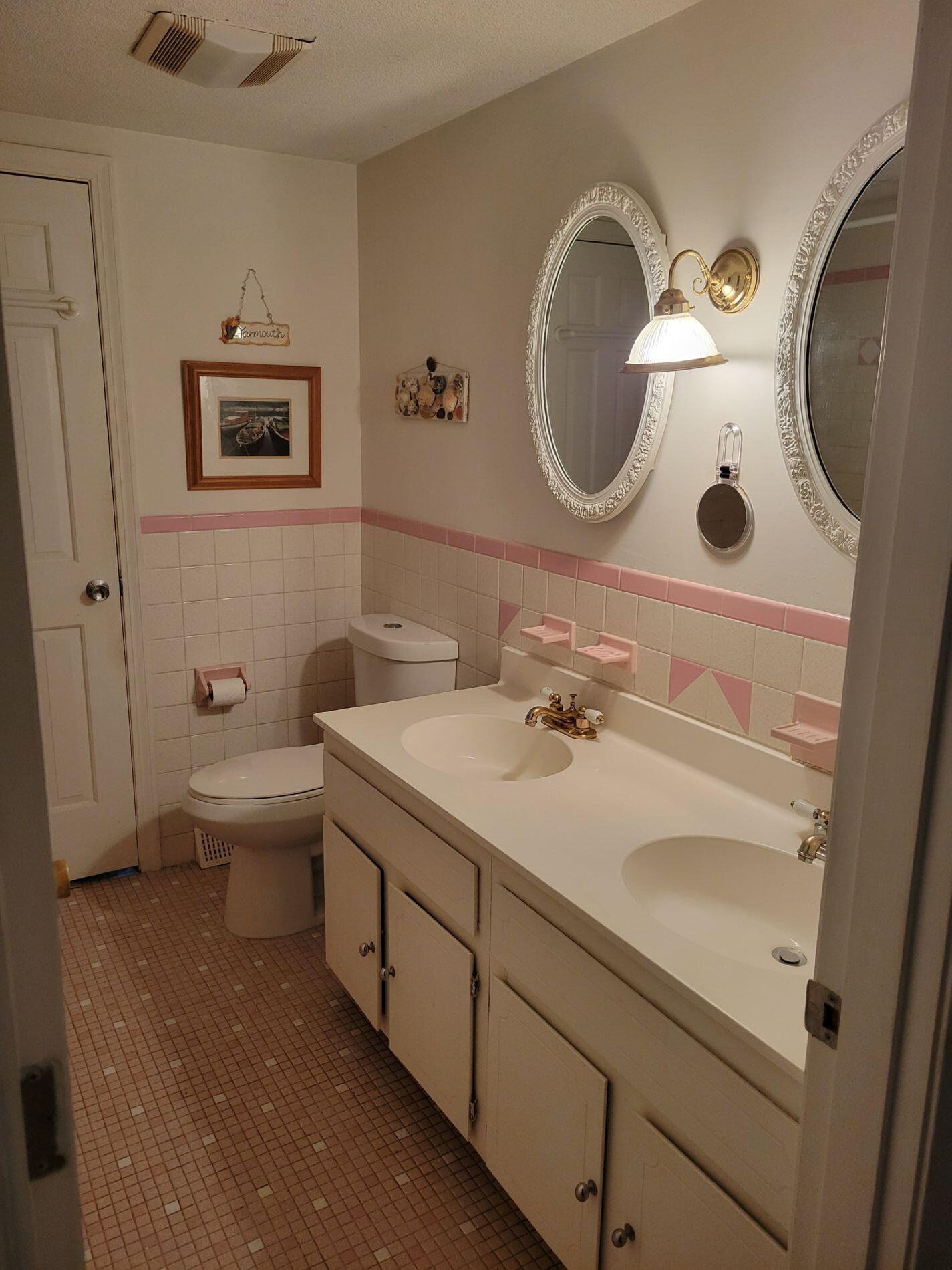 115 Captain Chase Road South Yarmouth, MA 02664 - Photo 17 of 36 a bathroom with a sink and a mirror