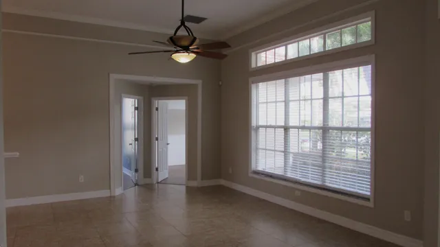 a view of an empty room with a window