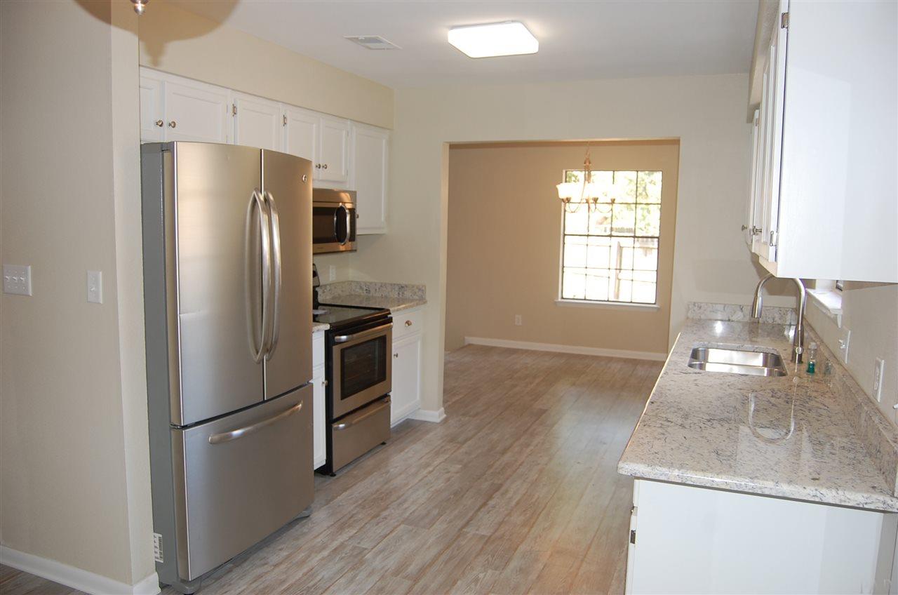 3021 Ranchette Square Gulf Breeze, FL 32563 - Photo 13 of 38 formal dining in background