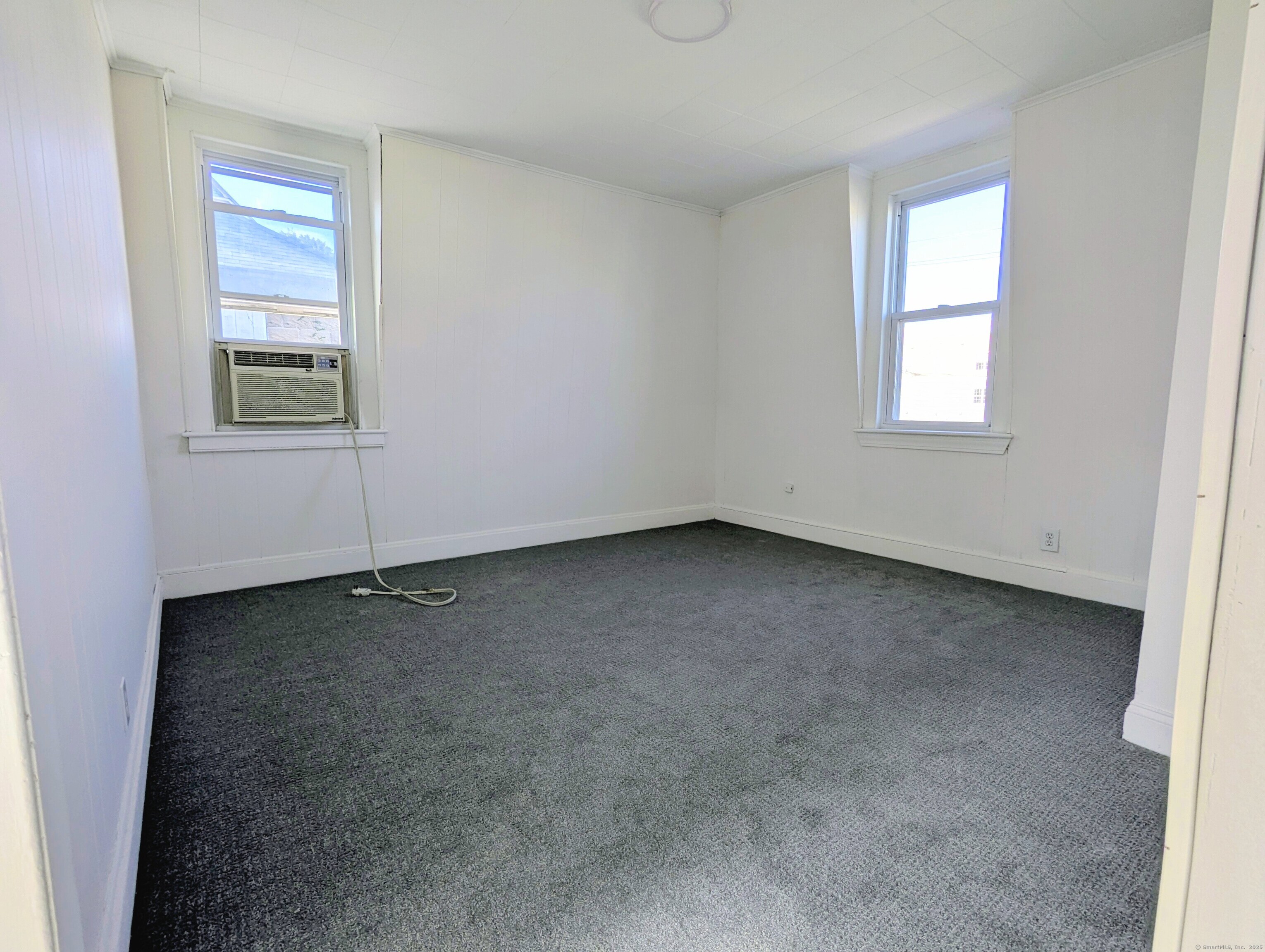 45 White Street Shelton, CT 06484 - Photo 5 of 10 an empty room with a window