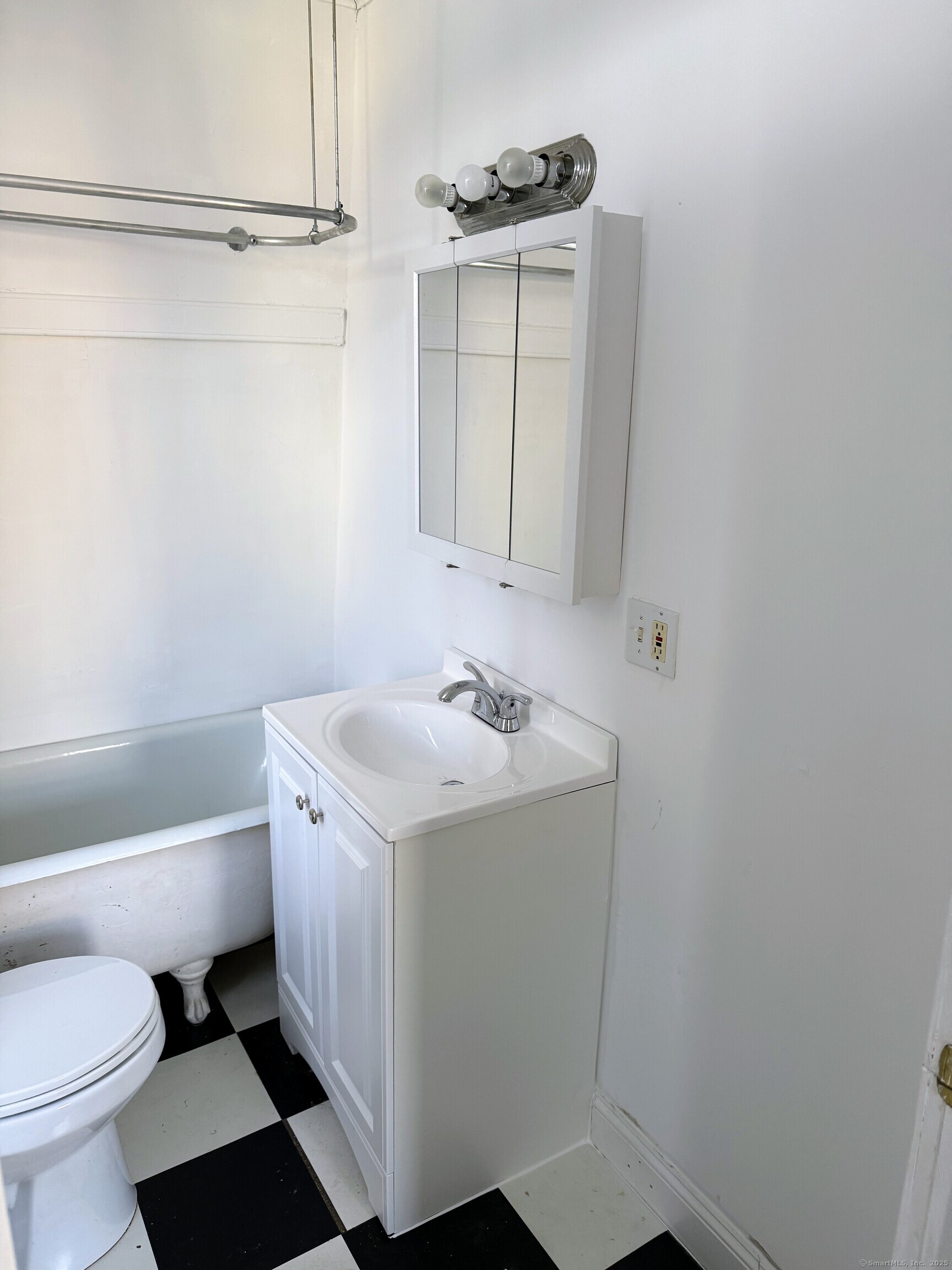 45 White Street Shelton, CT 06484 - Photo 9 of 10 a bathroom with a sink toilet and vanity