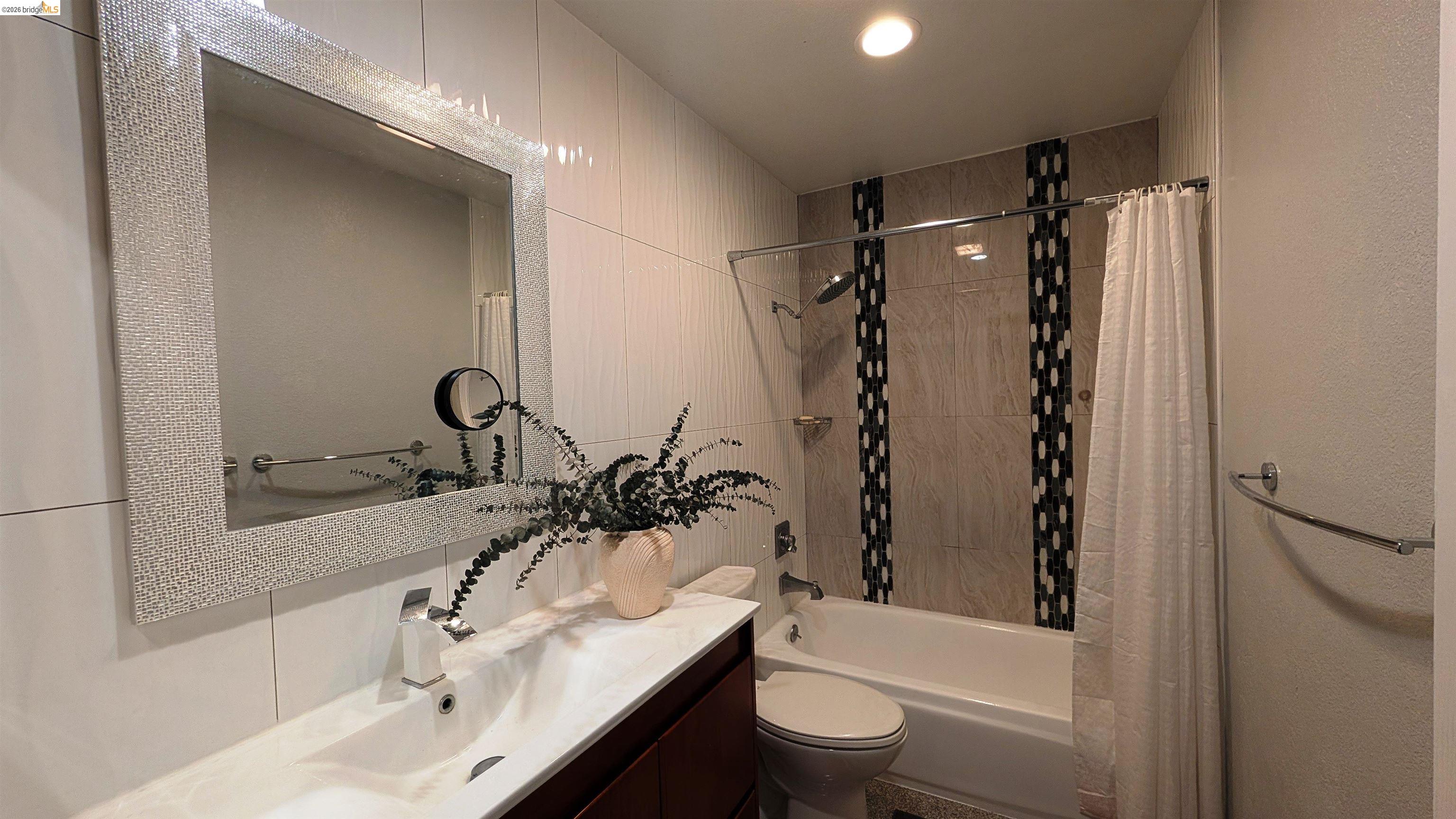 10013 Foxboro Circle San Ramon, CA 94583 - Photo 28 of 39 a bathroom with a sink toilet tub and shower