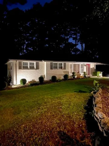 a view of a house with a big yard