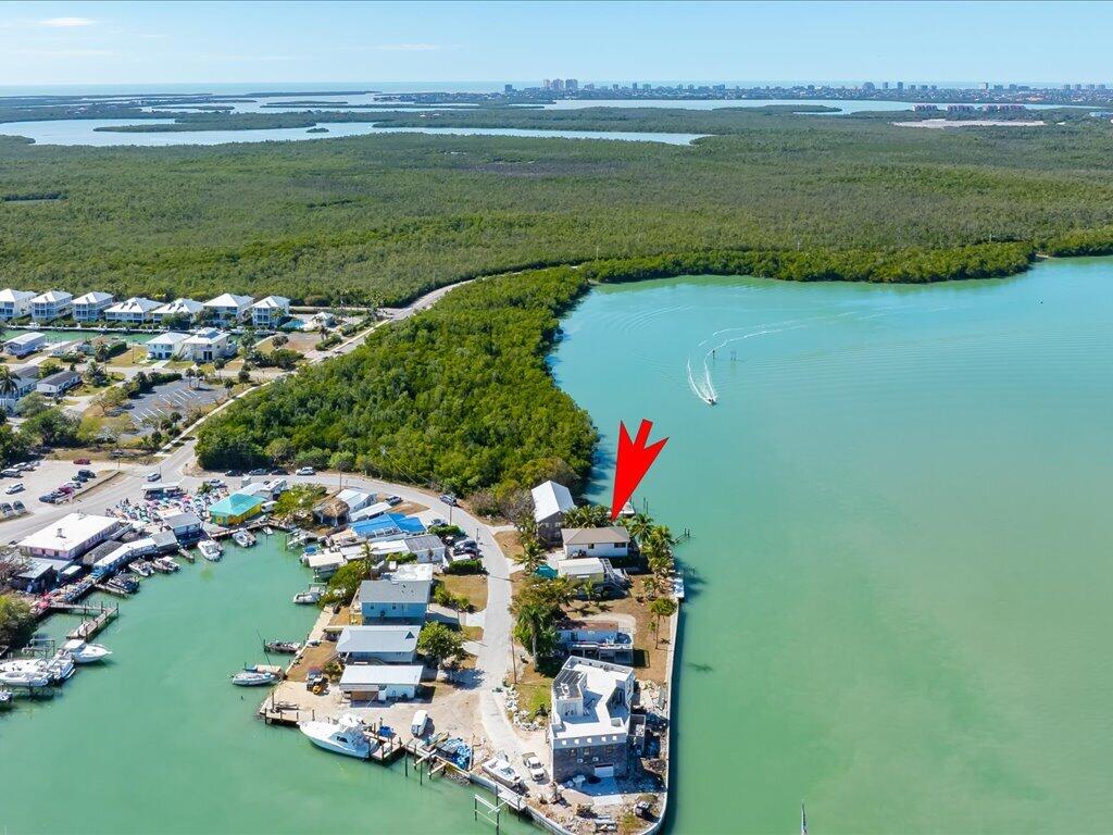 232 Harbor Place North Goodland, FL 34140 - Photo 16 of 24 a view of a lake with a city