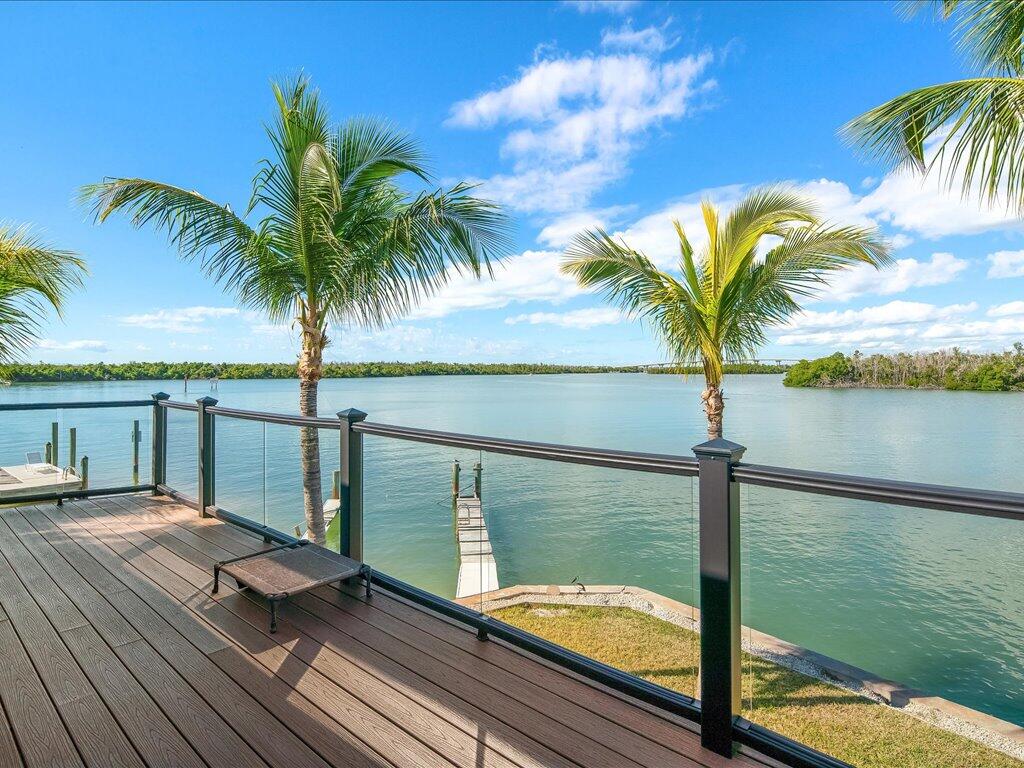 232 Harbor Place North Goodland, FL 34140 - Photo 2 of 24 a view of a lake with a terrace