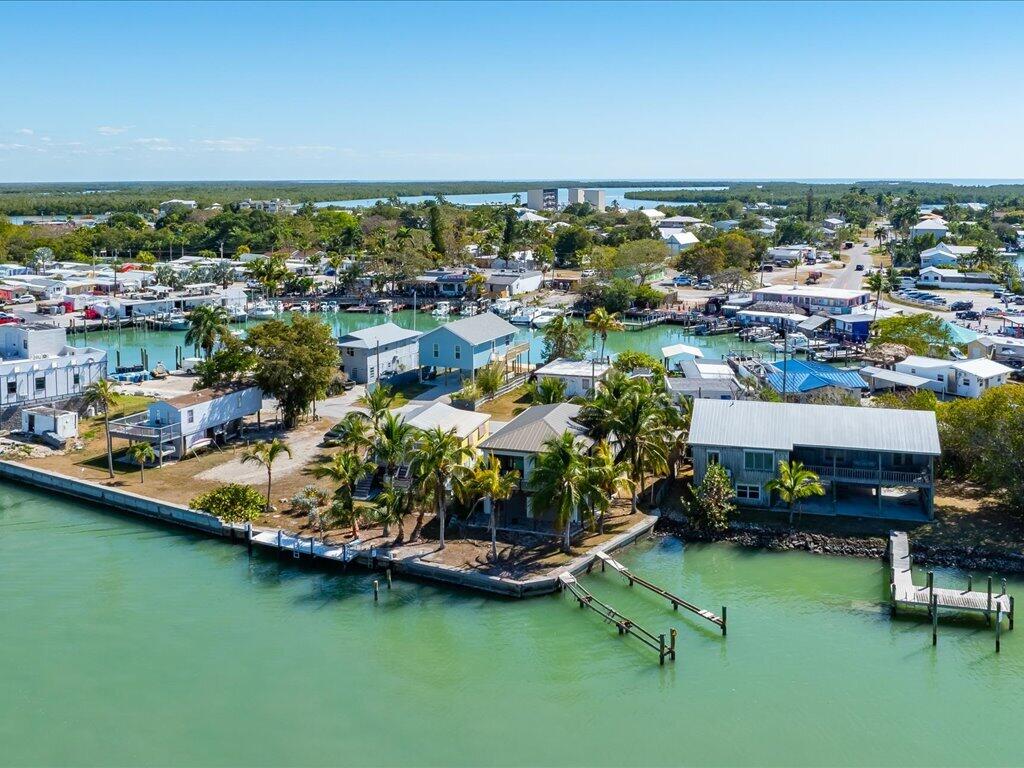 232 Harbor Place North Goodland, FL 34140 - Photo 3 of 24 a view of a city with lawn chairs