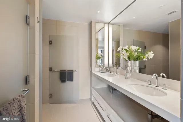 a view of a chair and tables in the patio