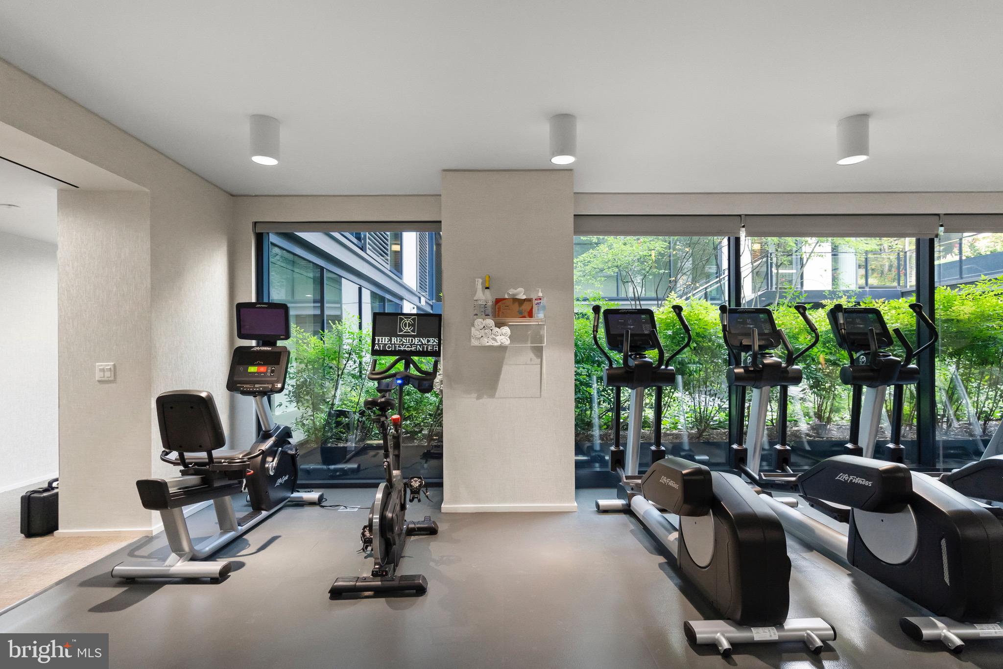 920 I Street Northwest, Unit 1009 Washington, DC 20001 - Photo 38 of 75 a view of a livingroom with furniture and floor to ceiling window
