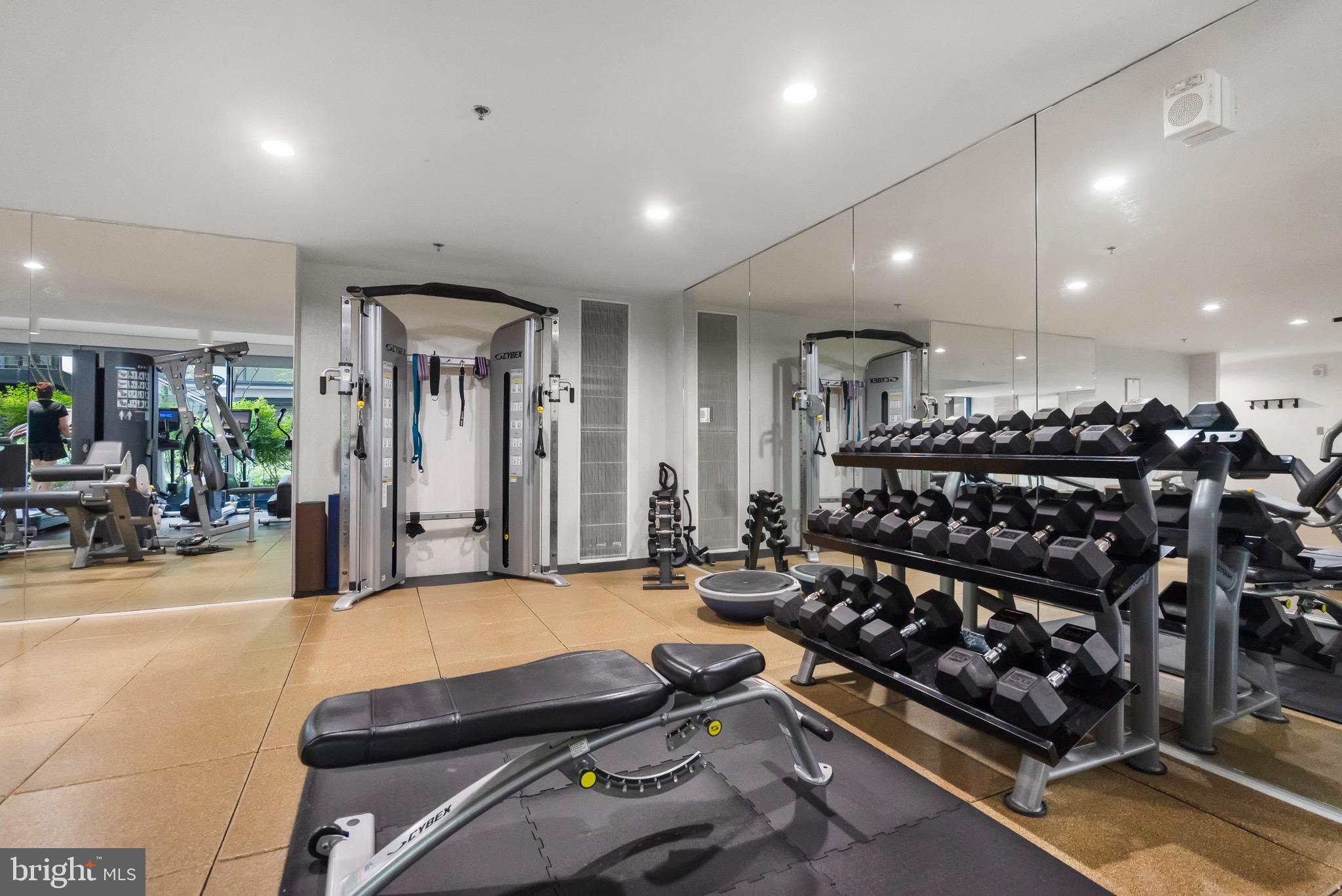 920 I Street Northwest, Unit 1009 Washington, DC 20001 - Photo 39 of 75 a room with lots of gym equipment