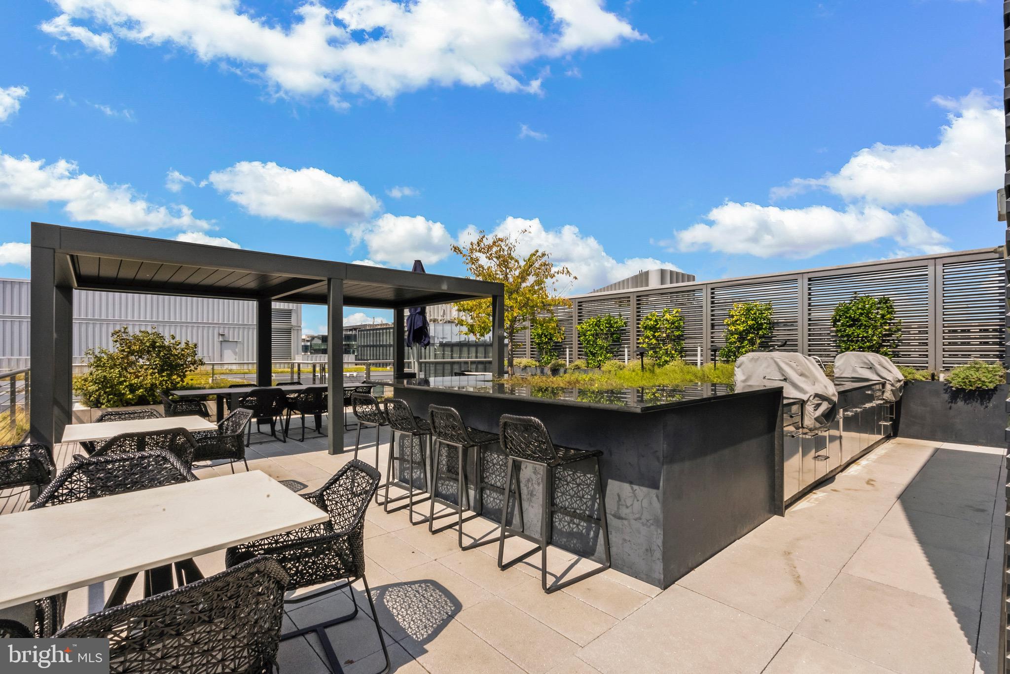 920 I Street Northwest, Unit 1009 Washington, DC 20001 - Photo 44 of 75 a view of a patio with swimming pool