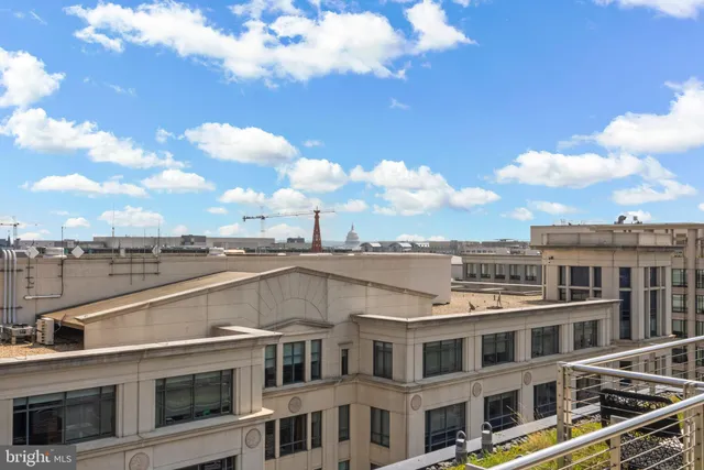a view of a city with tall buildings