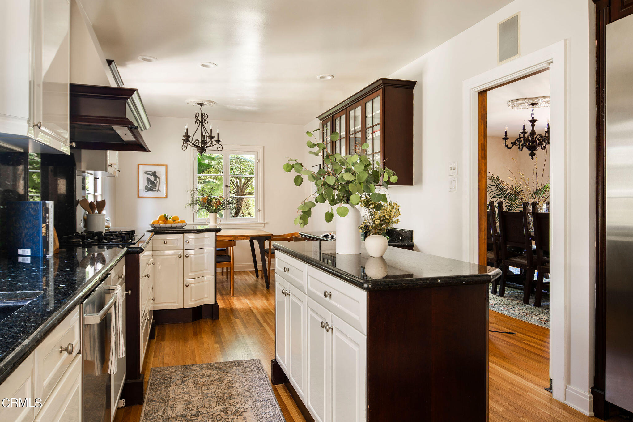 1211 Cortez Drive Glendale, CA 91207 - Photo 16 of 51 a kitchen with a sink stove and cabinets