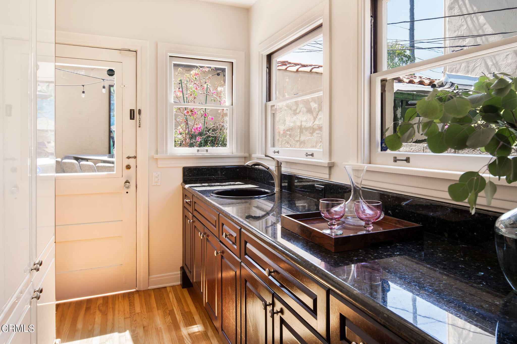 1211 Cortez Drive Glendale, CA 91207 - Photo 18 of 51 a kitchen with stainless steel appliances granite countertop a sink stove and cabinets