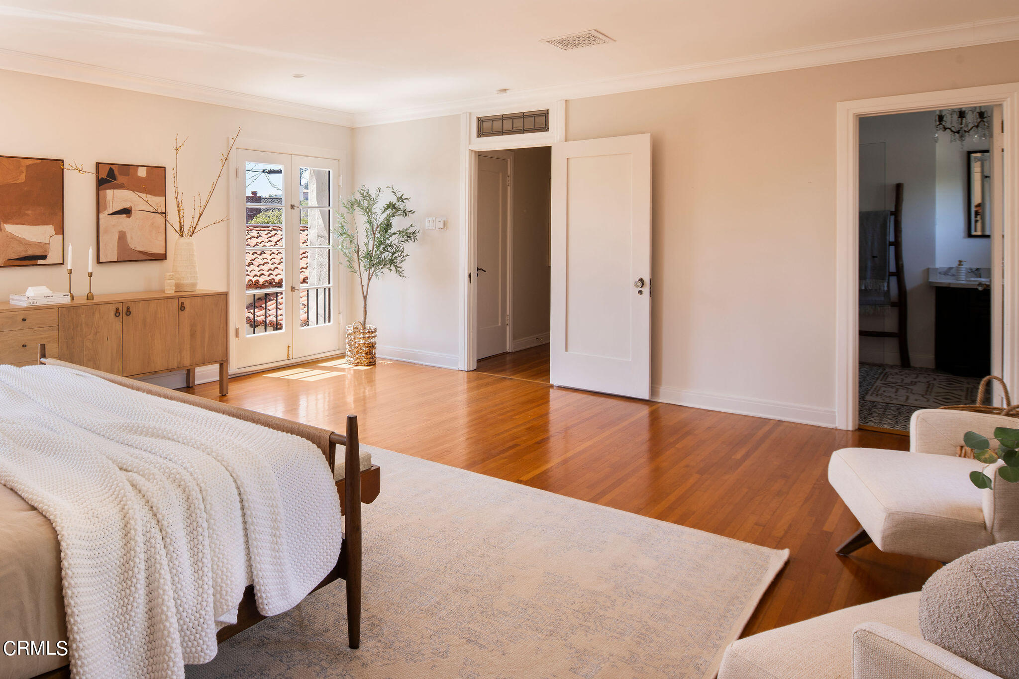 1211 Cortez Drive Glendale, CA 91207 - Photo 22 of 51 a spacious bedroom with a bed and wooden floor