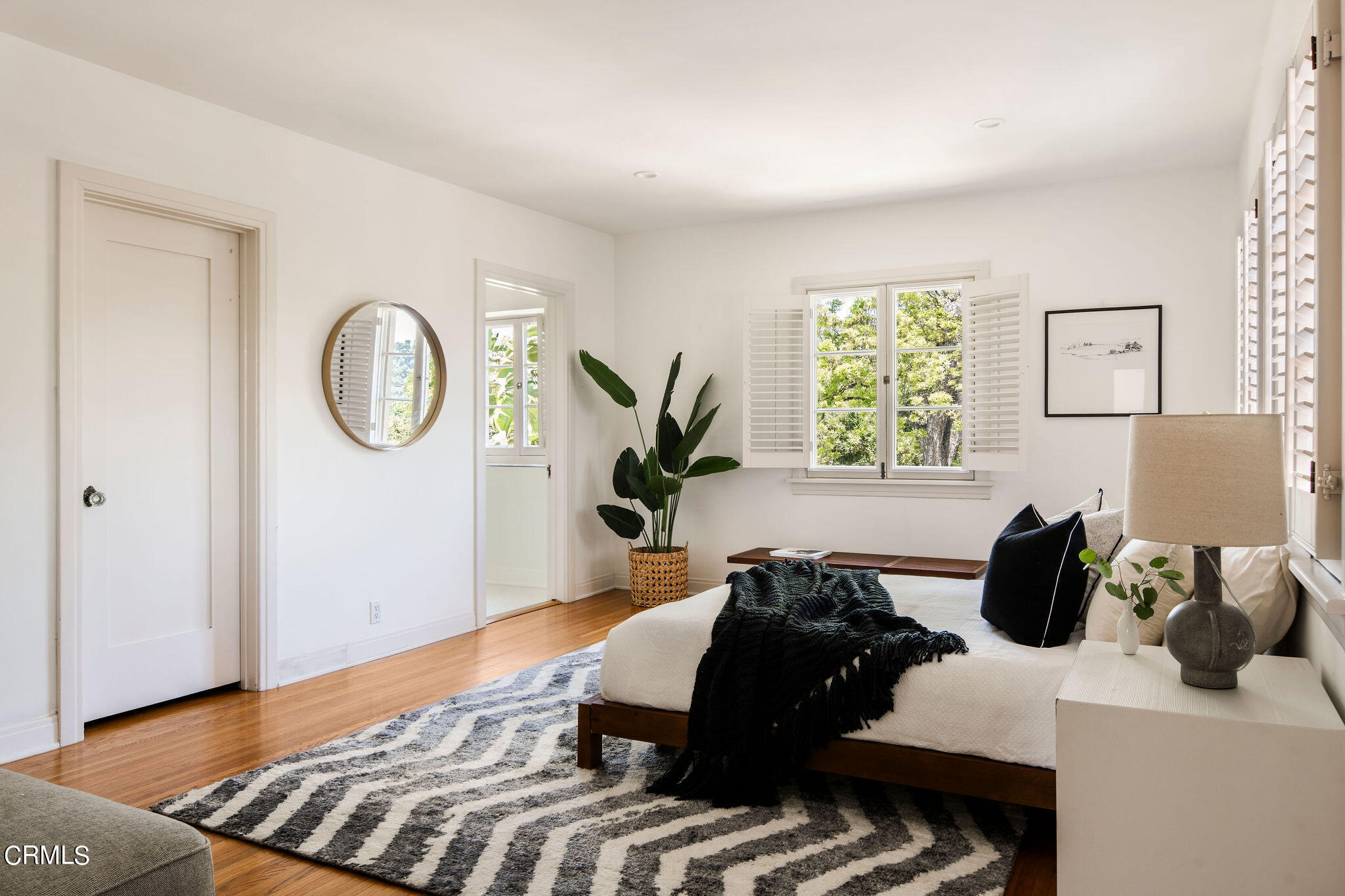 1211 Cortez Drive Glendale, CA 91207 - Photo 26 of 51 a bedroom with a bed a mirror and dresser