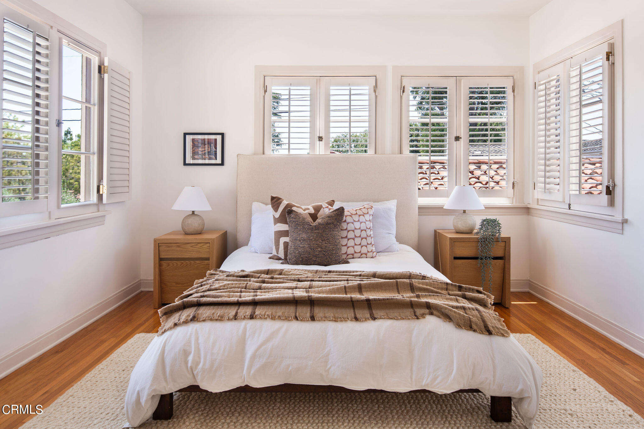 1211 Cortez Drive Glendale, CA 91207 - Photo 29 of 51 a bedroom with a bed and wooden floor