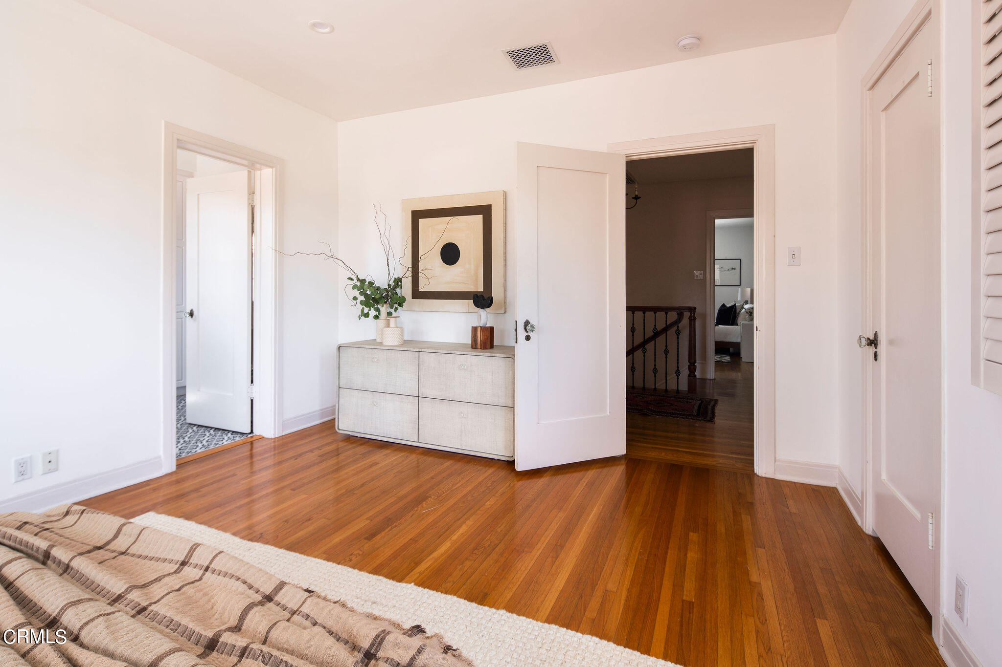 1211 Cortez Drive Glendale, CA 91207 - Photo 30 of 51 a bedroom with a bed and a view of bathroom