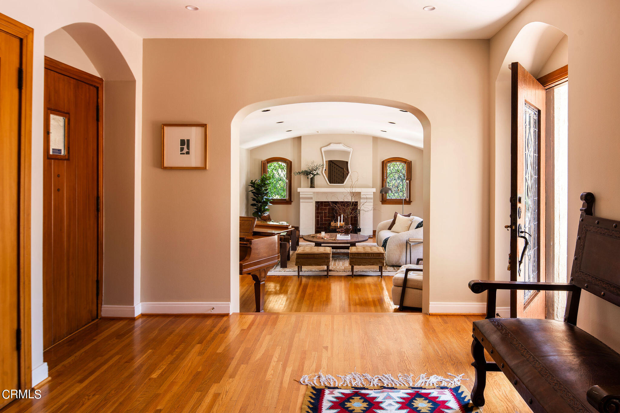 1211 Cortez Drive Glendale, CA 91207 - Photo 6 of 51 a living room with furniture and a large mirror next to a window