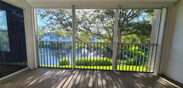 a view of balcony with garden