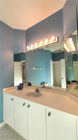 a bathroom with a shower and a toilet