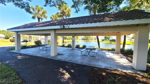 a view of a swimming pool with a patio