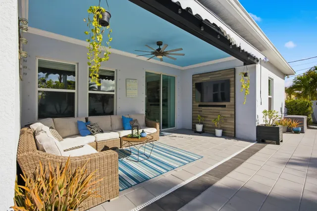 a outdoor living space with furniture and window