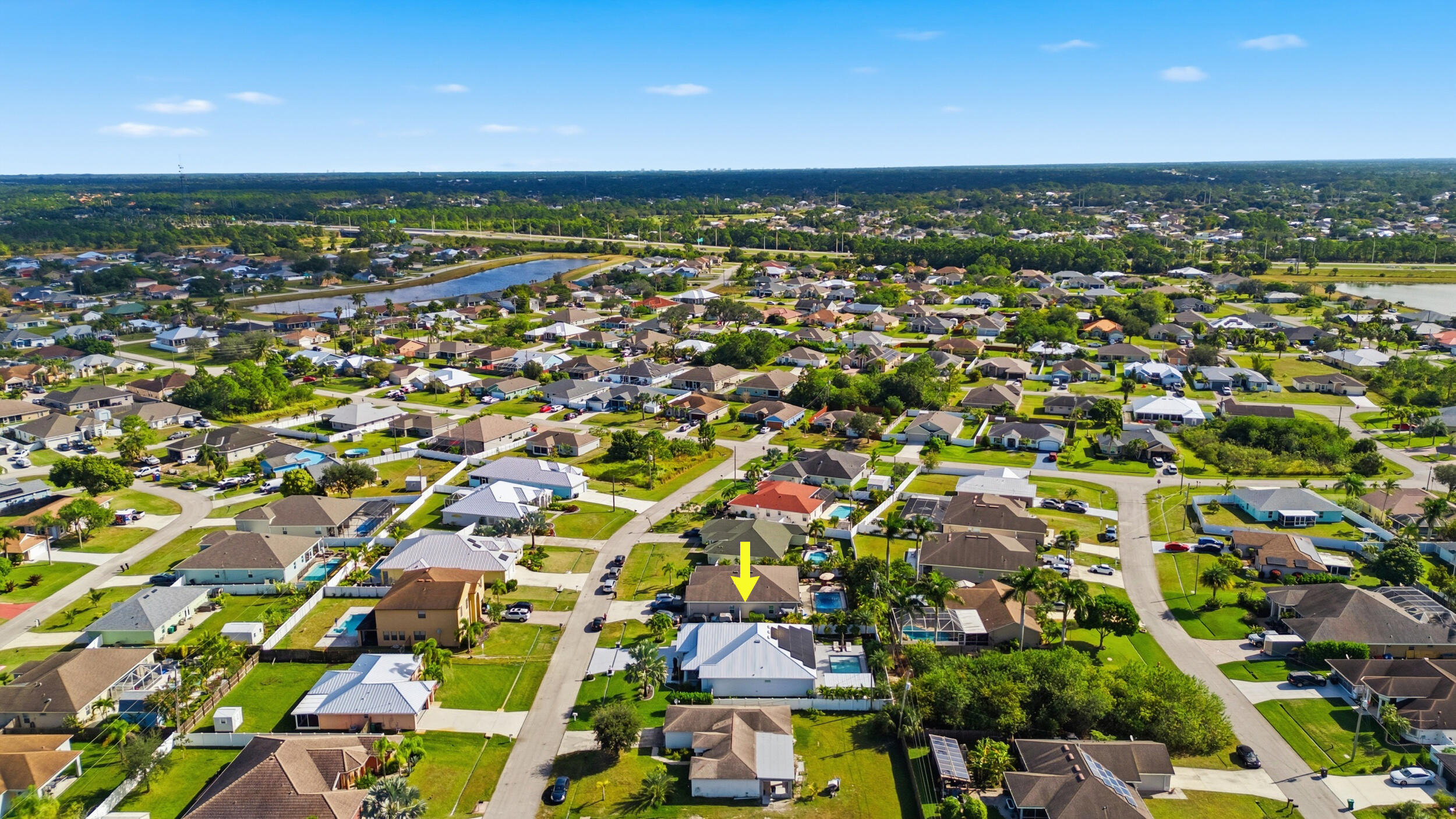2758 Southwest Onaway Avenue Port St. Lucie, FL 34987 - Photo 43 of 49 an aerial view of multiple house