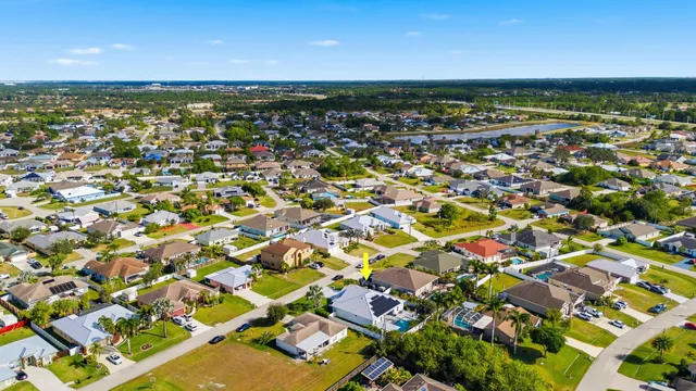 an aerial view of residential building with parking space