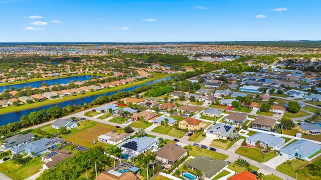 an aerial view of residential building and ocean