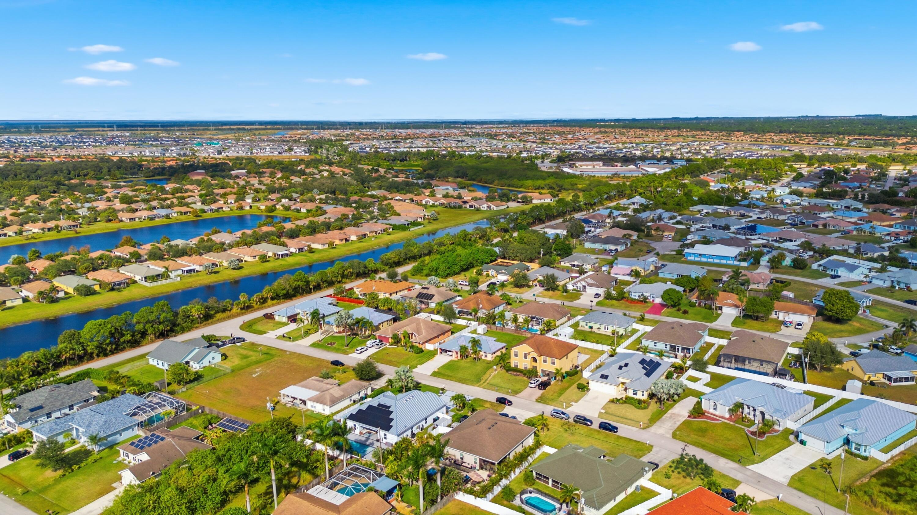 2758 Southwest Onaway Avenue Port St. Lucie, FL 34987 - Photo 46 of 49 an aerial view of residential building and ocean