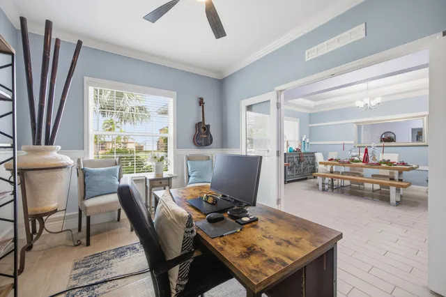 a view of a workspace with furniture and a livingroom