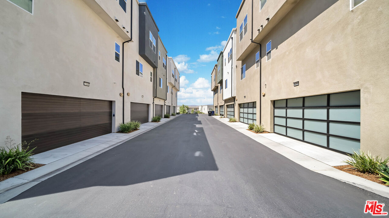 27009 Hummingbird Lane Valencia, CA 91381 - Photo 35 of 35 a view of balcony with two flat screen tv
