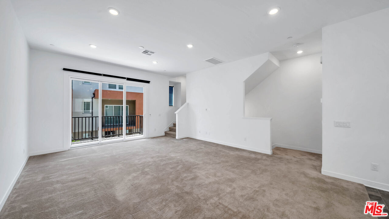 27009 Hummingbird Lane Valencia, CA 91381 - Photo 10 of 35 a view of an empty room with a window