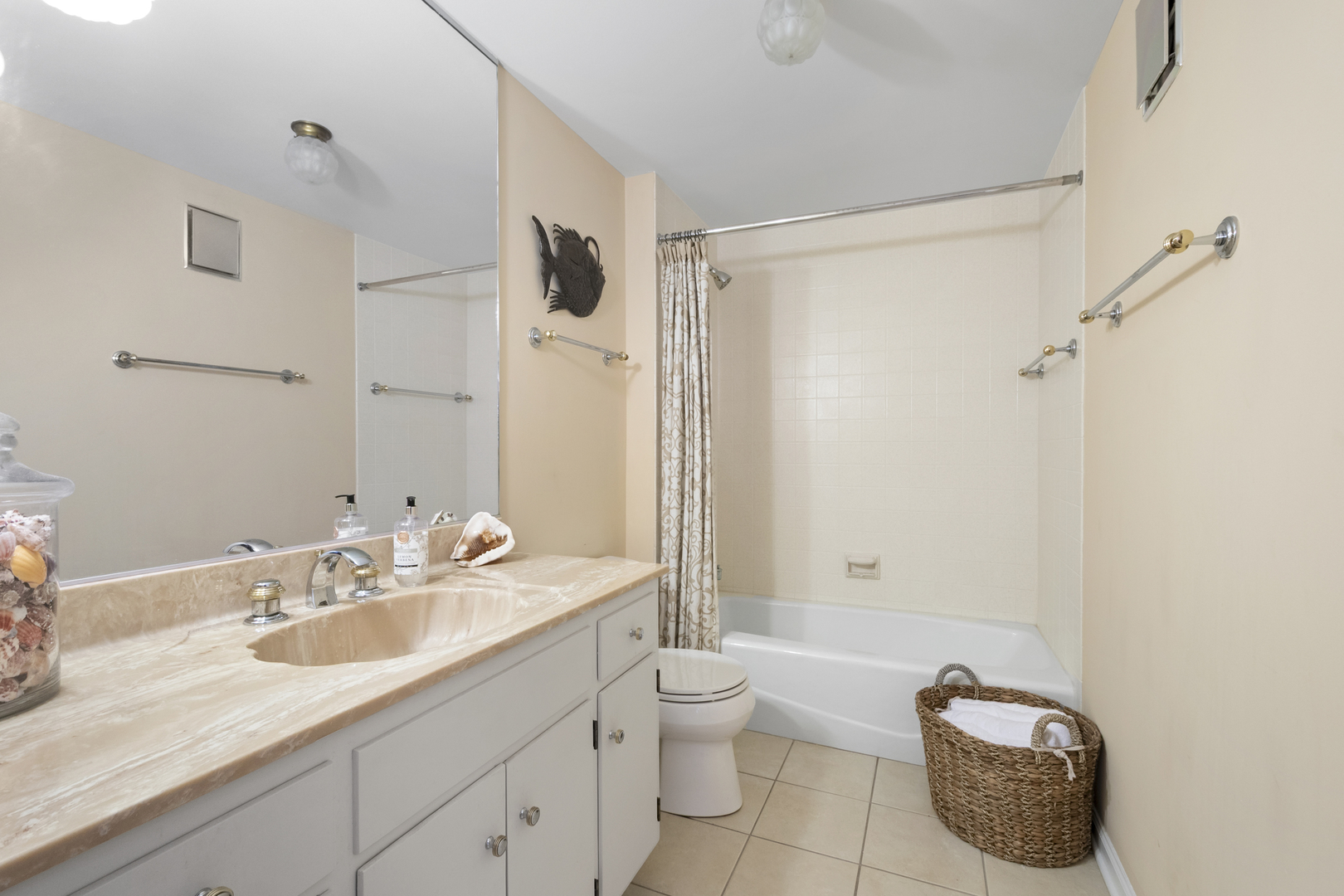 44 Park Lane, Unit 223 Park Ridge, IL 60068 - Photo 16 of 28 a bathroom with a granite countertop sink mirror vanity and toilet